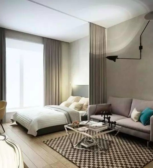 ▼大开间用窗帘隔开卧室和客厅,即保证睡眠区私密性,又给客厅更好的